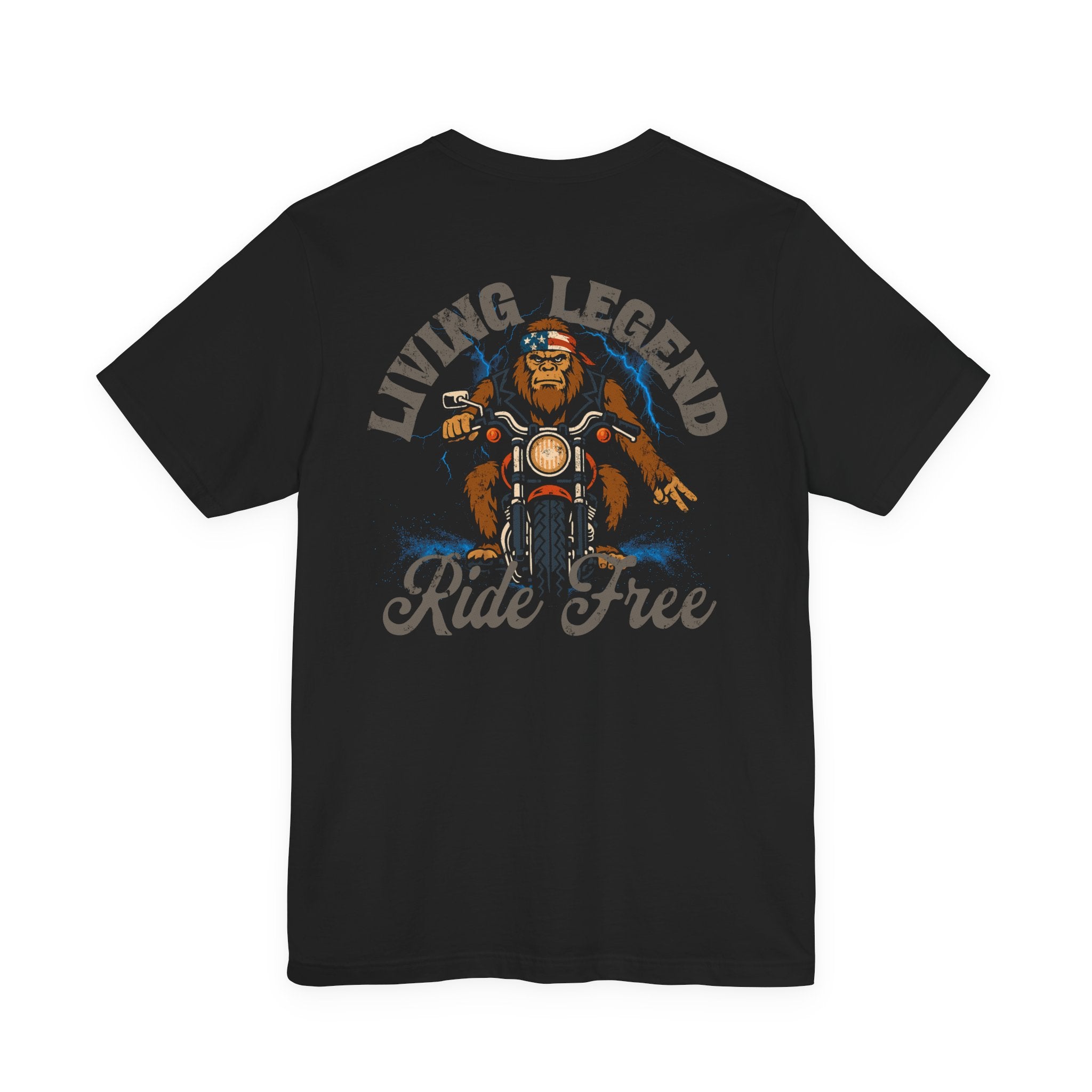 Black t-shirt with a graphic of a bear on a motorcycle and text 'Living Legend Ride Free' on the back.