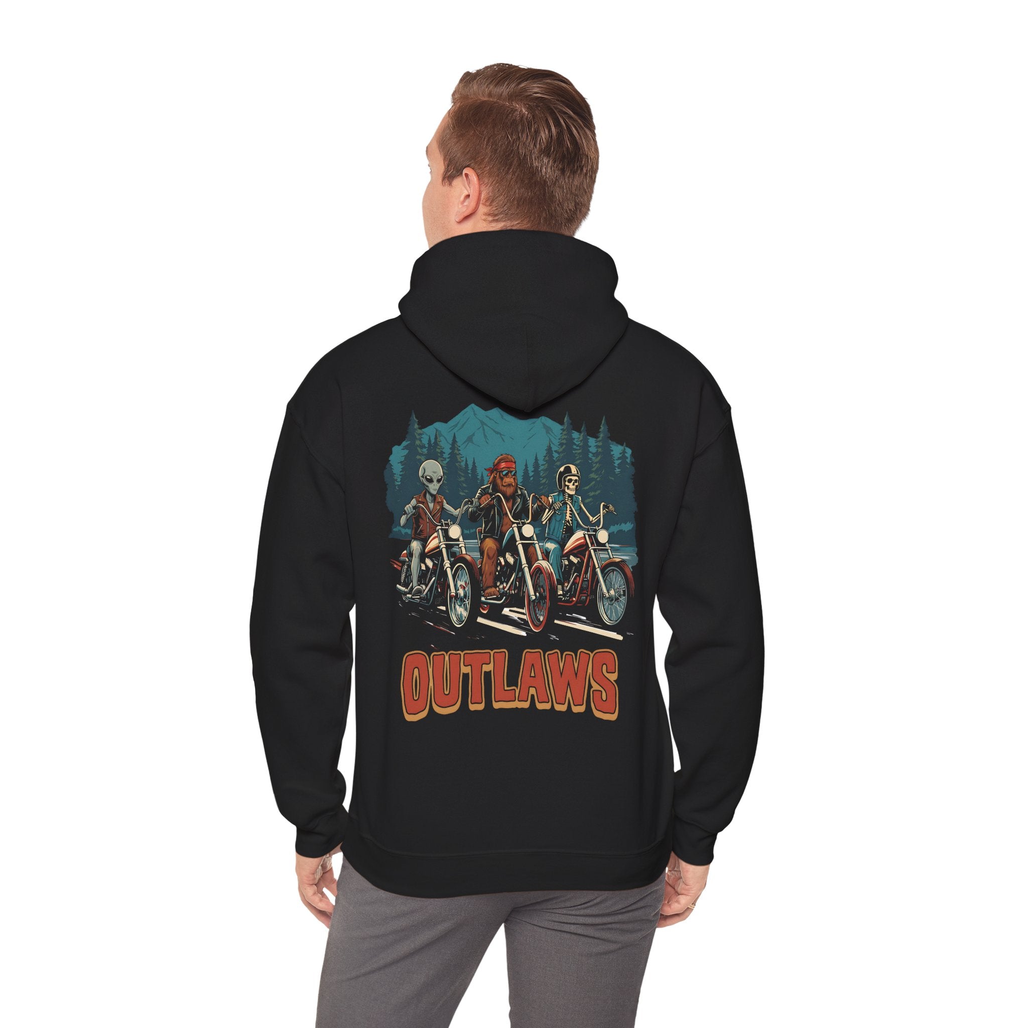 Person wearing a black hoodie with 'Outlaws' graphic on the back
