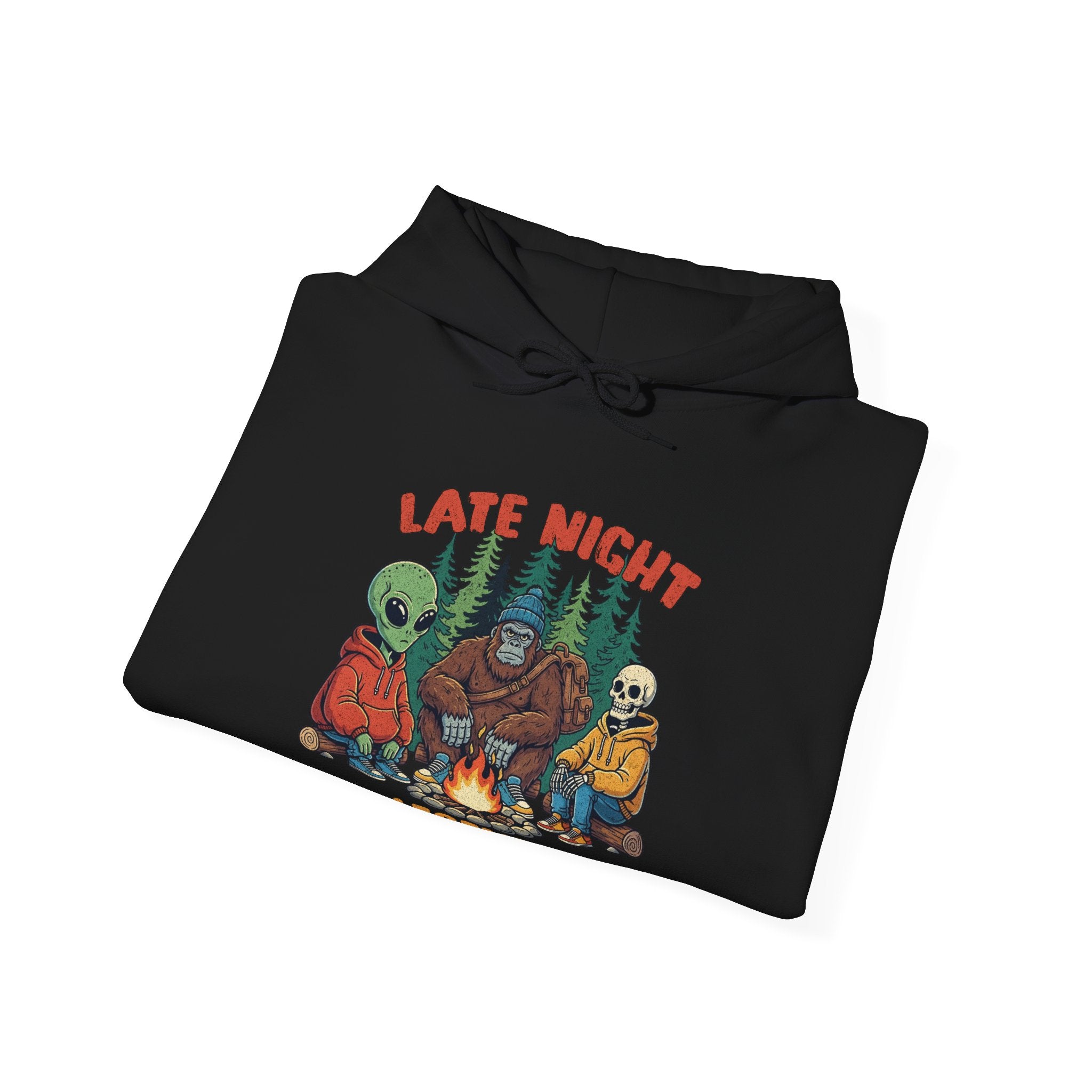 Black hoodie with a graphic design featuring an alien, gorilla, and skeleton around a campfire with 'Late Night' text.