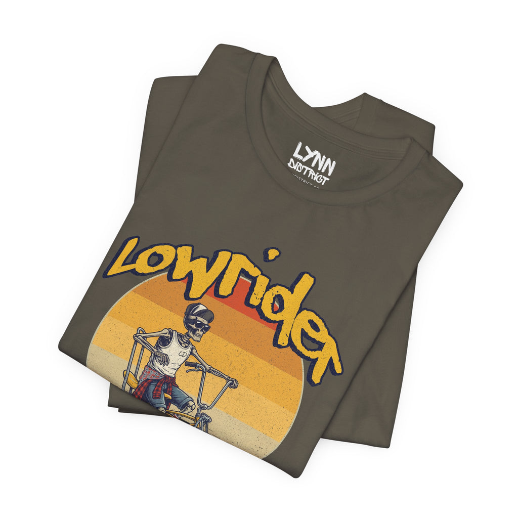 Folded t-shirt with 'Lowrider' design and Lynn logo on a white background